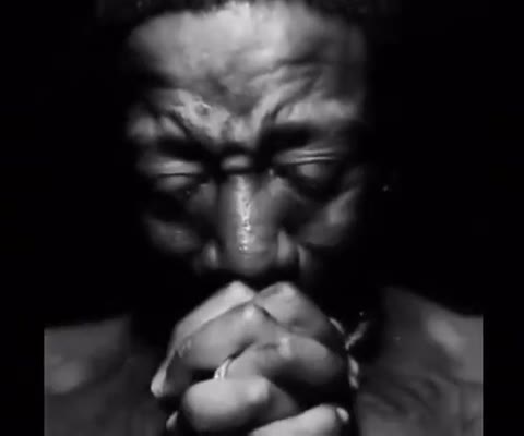 Black Guy Praying GIF meme template